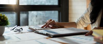 Accounting tutor in Northampton woman doing calculations